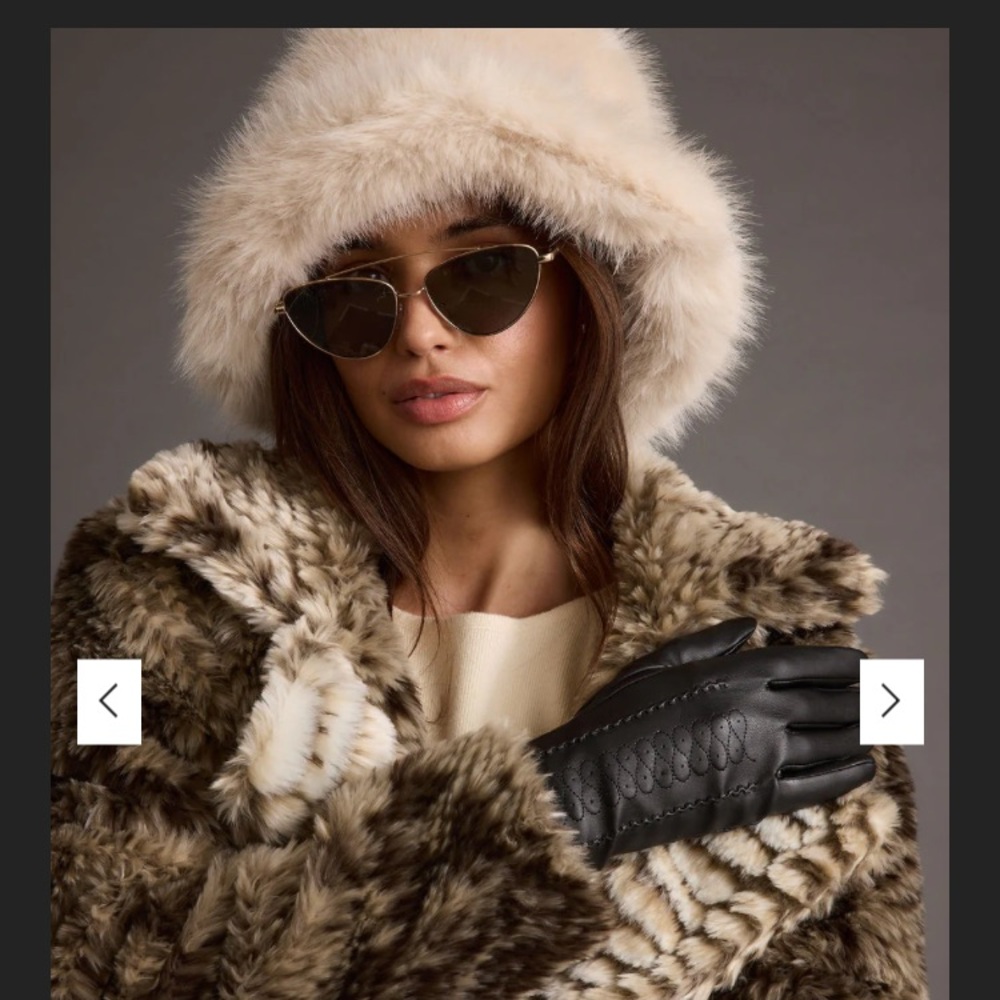 Free People Faux Fur hat in tan/ beige/ brown